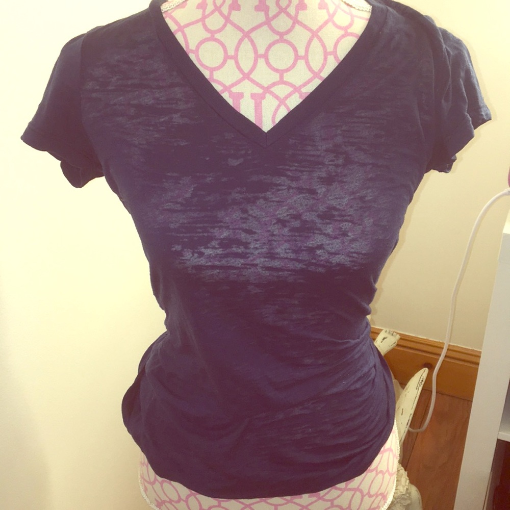 Blue tank with gold piece sign